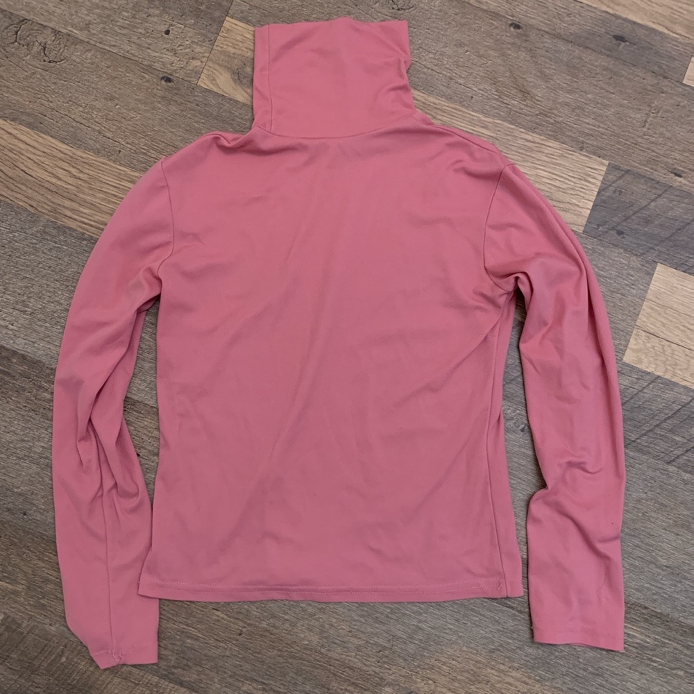 Pink turtleneck